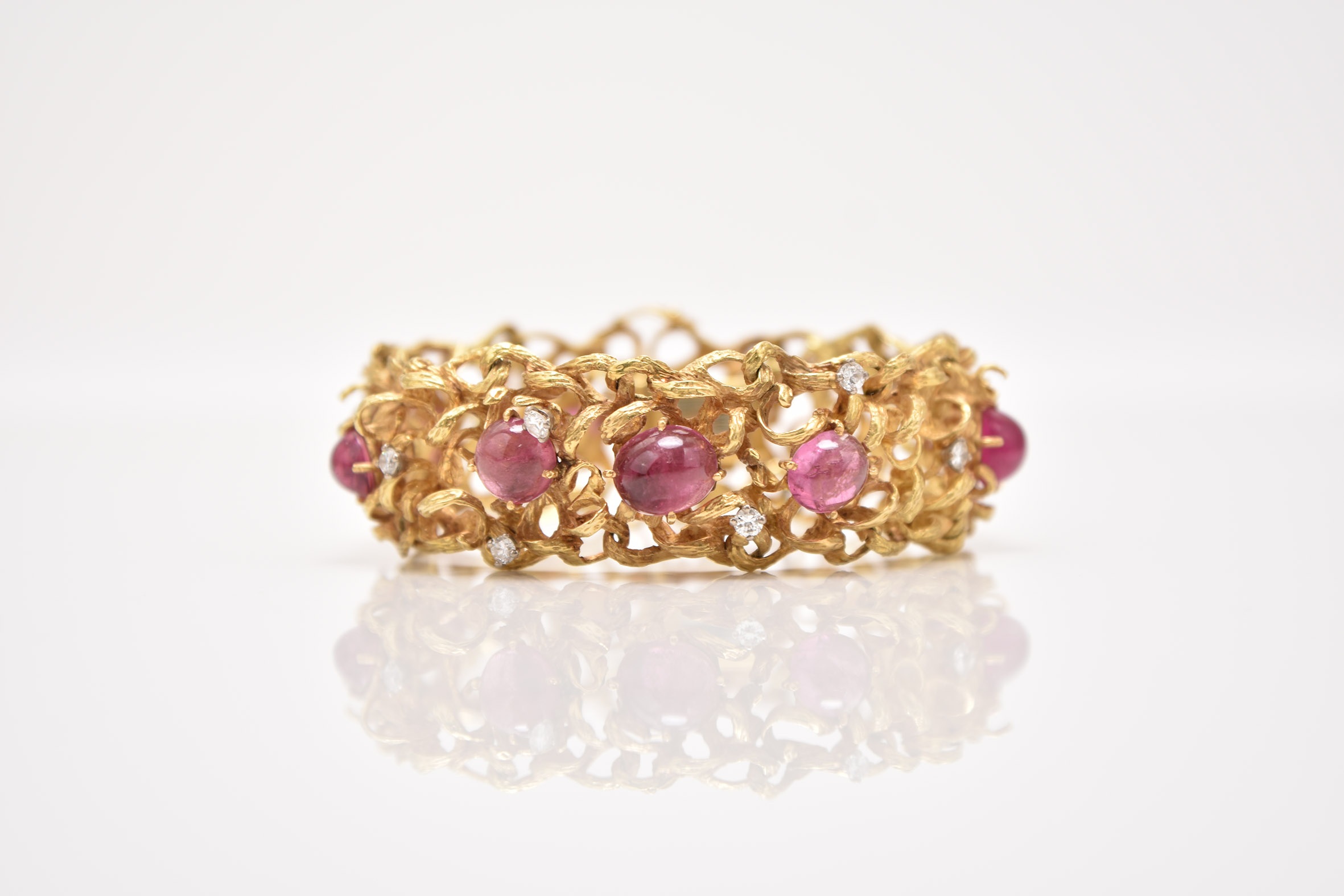 An 18ct gold pink tourmaline and diamond bracelet Sold for £6,000 Halls